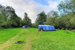 Non Electric Grass Tent Pitches at Wellstone Yurts and Camping