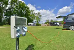 Electric grass pitches at Oakmoor Touring Park Electric grass pitches at Oakmoor Touring Park