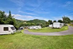 Grass Touring Pitches (Awnings) at Cwmdu Campsite