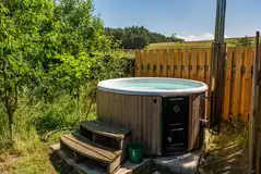 Optional wood-fired hot tub Optional wood-fired hot tub