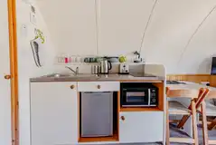 Kitchen with a sink, kettle, toaster, fridge, freezer, hob and combi oven Kitchen with a sink, kettle, toaster, fridge, freezer, hob and combi oven