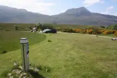 Electric Grass Pitches at Badrallach Campsite, Bothy and Holiday Cottage