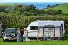 The Paddock Grass Pitches at Bolberry House Farm Caravan and Camping Park