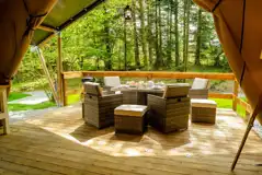 Safari tent decking area with outdoor furniture