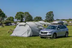 Non Electric Grass Tent Pitches at Orcaber Farm Caravan and Camping Park