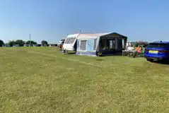 Electric Grass Pitches at Elm Cottage Touring Park