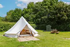 Furnished bell tent with private toilet