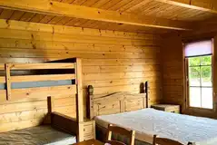 Swallows cabin with a double bed and bunks Swallows cabin with a double bed and bunks