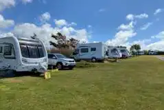 Premium Fully Serviced Grass Pitches at Tollgate Farm Caravan and Camping Park