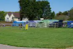 Fully Serviced Pitches with Grass Mesh at Sunnymead Farm Camping and Touring Site