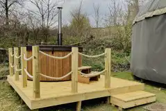 Yurts With Wood Fired Hot Tub at The Garlic Farm Yurts