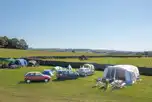 Electric Grass Tent Pitches at Orcaber Farm Caravan and Camping Park