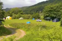 Grass Pitches (River Field) at Llechrwd Farm Camping