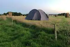 Non Electric Small Grass Tent Pitches at Roselidden House Camping