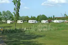 Grass Pitches with Optional Electric at Riverside Village Holiday Park