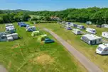 XL Electric Grass Pitches at Norden Farm Campsite