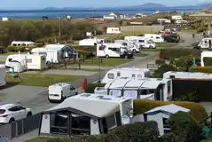 Electric Hardstanding with Grass Touring Pitches at Hendre Mynach Camping and Touring Park