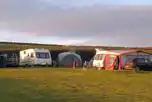 Electric Grass Pitches at Incledon Farm Camping