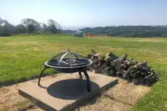 Non Electric Grass Tent Pitches with Firepit at Ser a Mor Camping