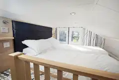 Mezzanine level with twin beds