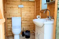 Chestnut toilet cabin