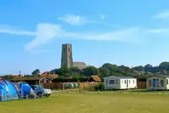 Electric Grass Pitches (Church View) at Manor Caravan Park