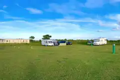 Electric Grass Pitches (Lighthouse View) at Manor Caravan Park