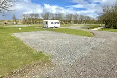 Hardstanding 8m x 8m pitches with 16 amp electric hook ups Hardstanding 8m x 8m pitches with 16 amp electric hook ups