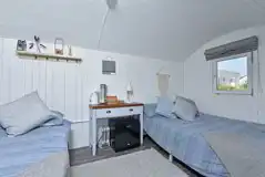 Dahlia,lLavender and Fuchsia glamping pod interior