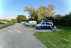Non Electric Hardstanding and Grass Touring Pitches  at Between Rivers Camping