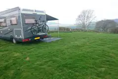 Grass Motorhome Pitches 7m (Optional Electric) at Spring Field Dark Skies Eco Camp
