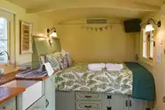 Keepers Cosy Shepherd's Hut at Two Hoots Glamping Site
