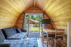 Bambi ensuite glamping pod dining area and TV Bambi ensuite glamping pod dining area and TV
