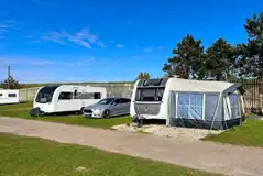 Electric Grass Caravan Pitches at Lakeland Caravan Park