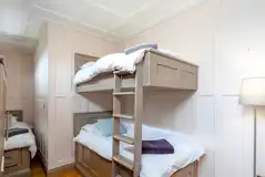 The Ark houseboat with a bunk bedroom