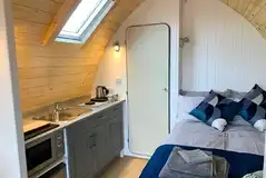 Glamping pod double bed with bedding provided