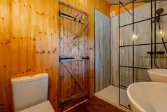 Luxury adult only safari tent ensuite bathroom with towels provided Luxury adult only safari tent ensuite bathroom with towels provided