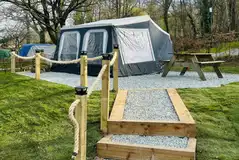 Isabella ready trailer tent with a picnic bench