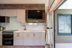 Family hideaway kitchen with hob, dishwasher, microwave, fridge, toaster and kettle