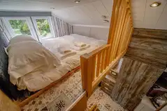 Family hideaway mezzanine level with double bed (bedding and towels provided)