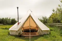 Spacious but cosy furnished bell tent with king sized bed Spacious but cosy furnished bell tent with king sized bed