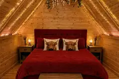 Cabin interior with double bed Cabin interior with double bed