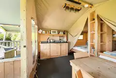 Safari tent kitchen and dining area
