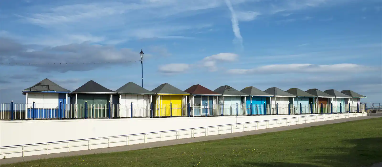 Colourful beach huts at Sutton-on-Sea